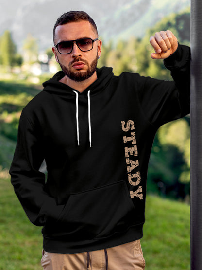Model wearing Men's Black Hoodie Sweatshirt with 'Steady' design, offering effortless style and premium comfort