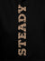 Close up of 'Steady' design on Women's Black Hoodie Sweatshirt, highlighting intricate details and vibrant print.
