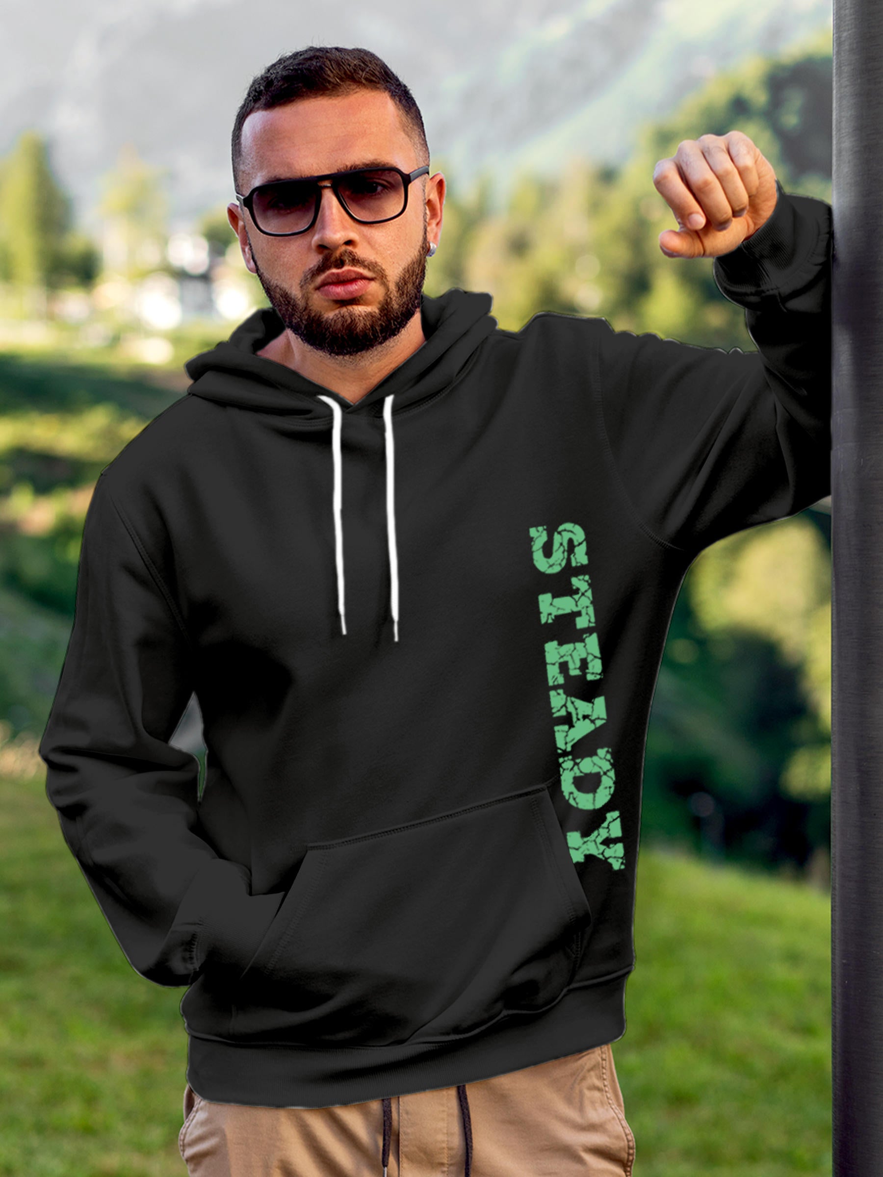 Model wearing Men's Dark Grey Hoodie Sweatshirt with 'Steady' design, offering effortless style and premium comfort