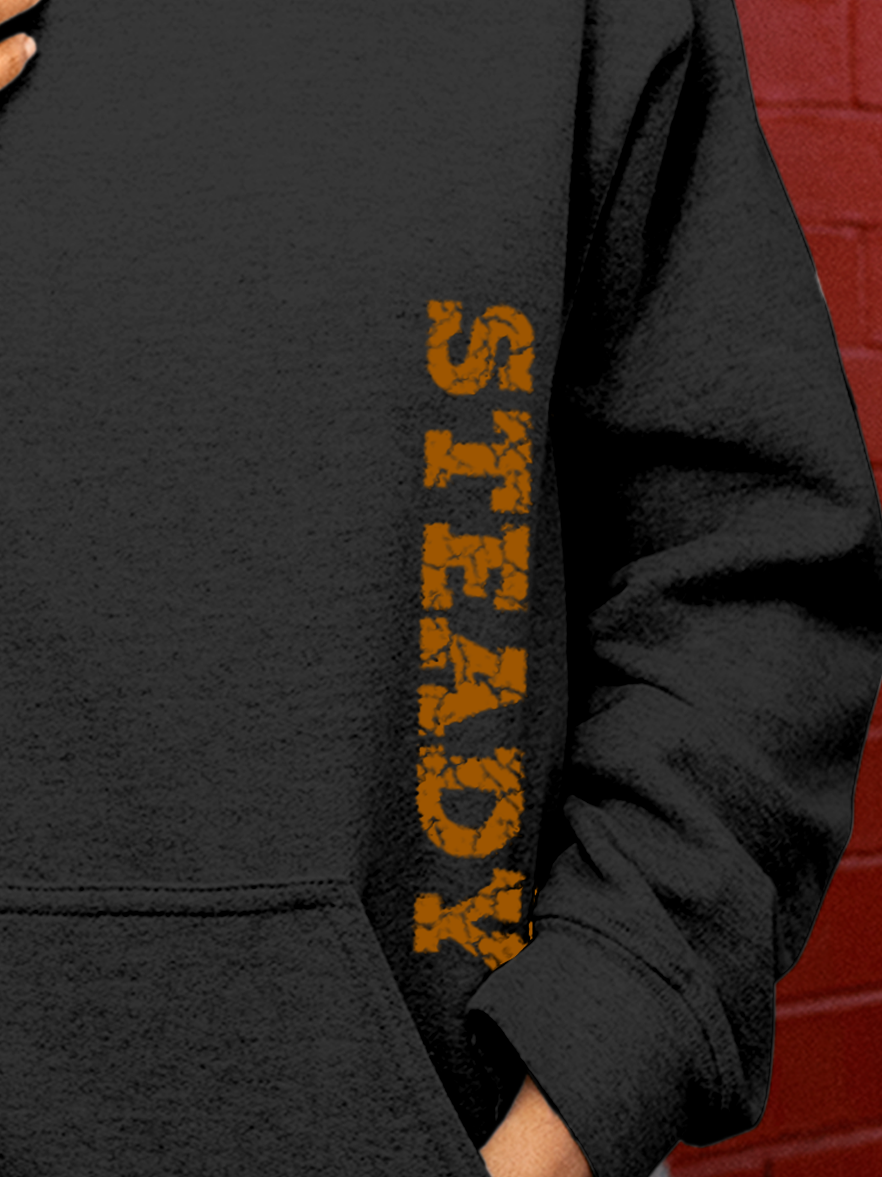 Close up of 'Steady' design on Women's Charcoal Grey Hoodie Sweatshirt, highlighting intricate details and vibrant print.