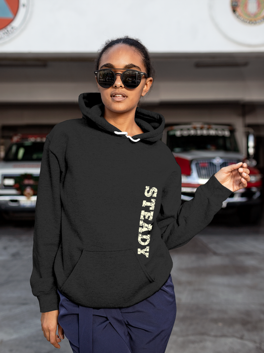Fighterhero Hoodie Collection: Model wearing Women's Charcoal Grey Hoodie Sweatshirt with 'Steady' design