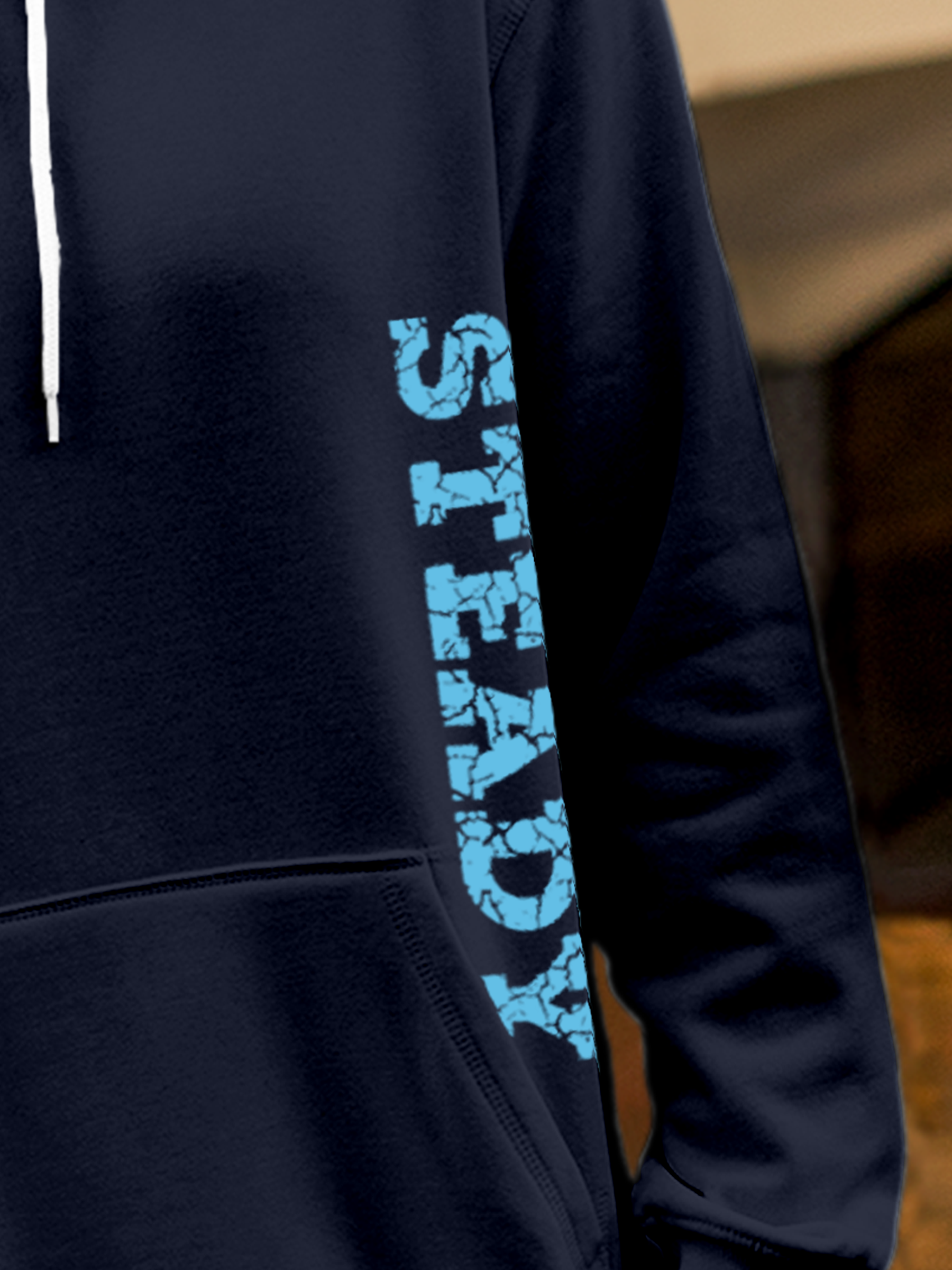 Close up of 'Steady' design on Men's Navy Blue Hoodie Sweatshirt, highlighting intricate details and vibrant print.