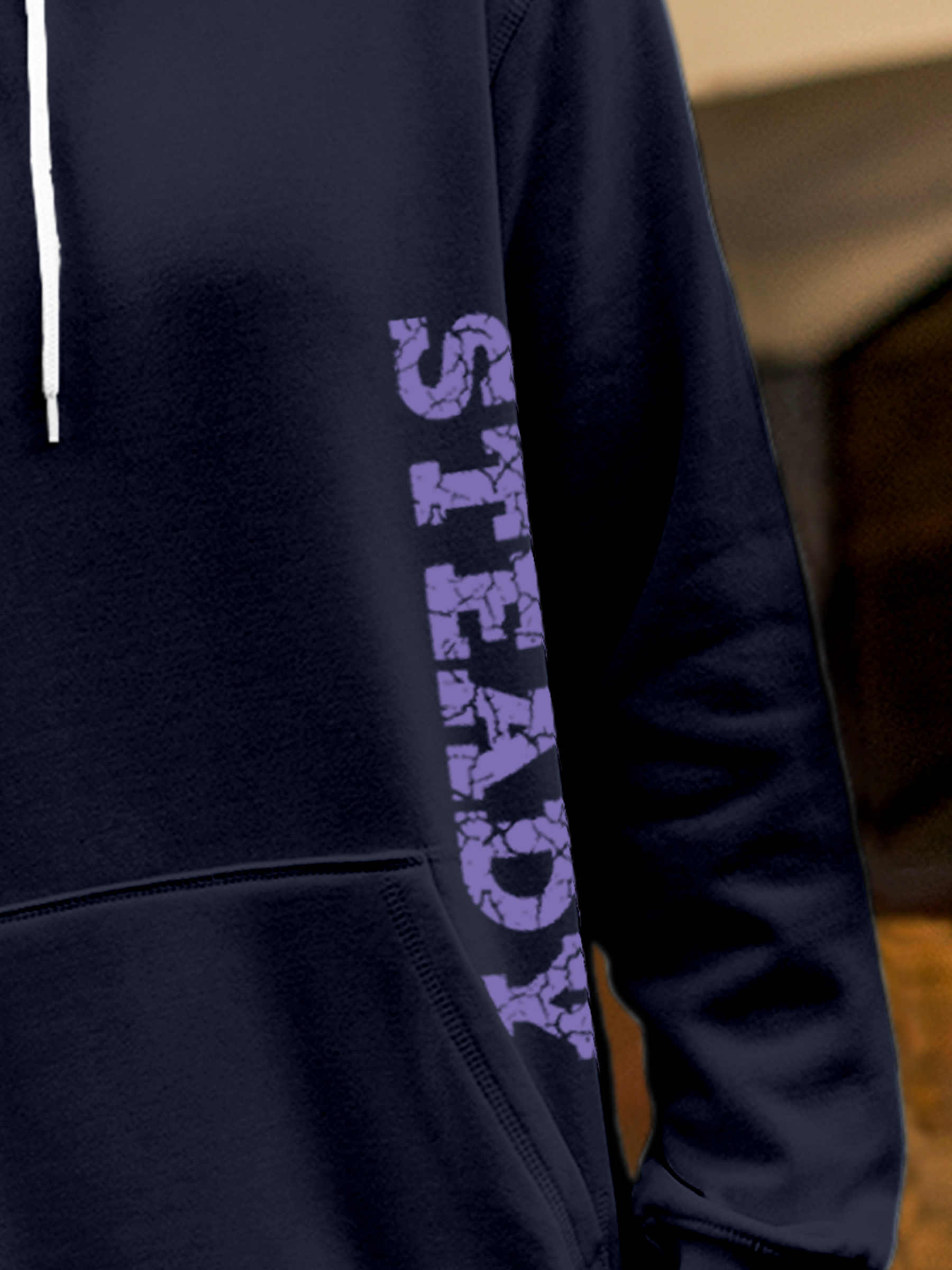 Close up of 'Steady' design on Men's Navy Blue Hoodie Sweatshirt, highlighting intricate details and vibrant print.