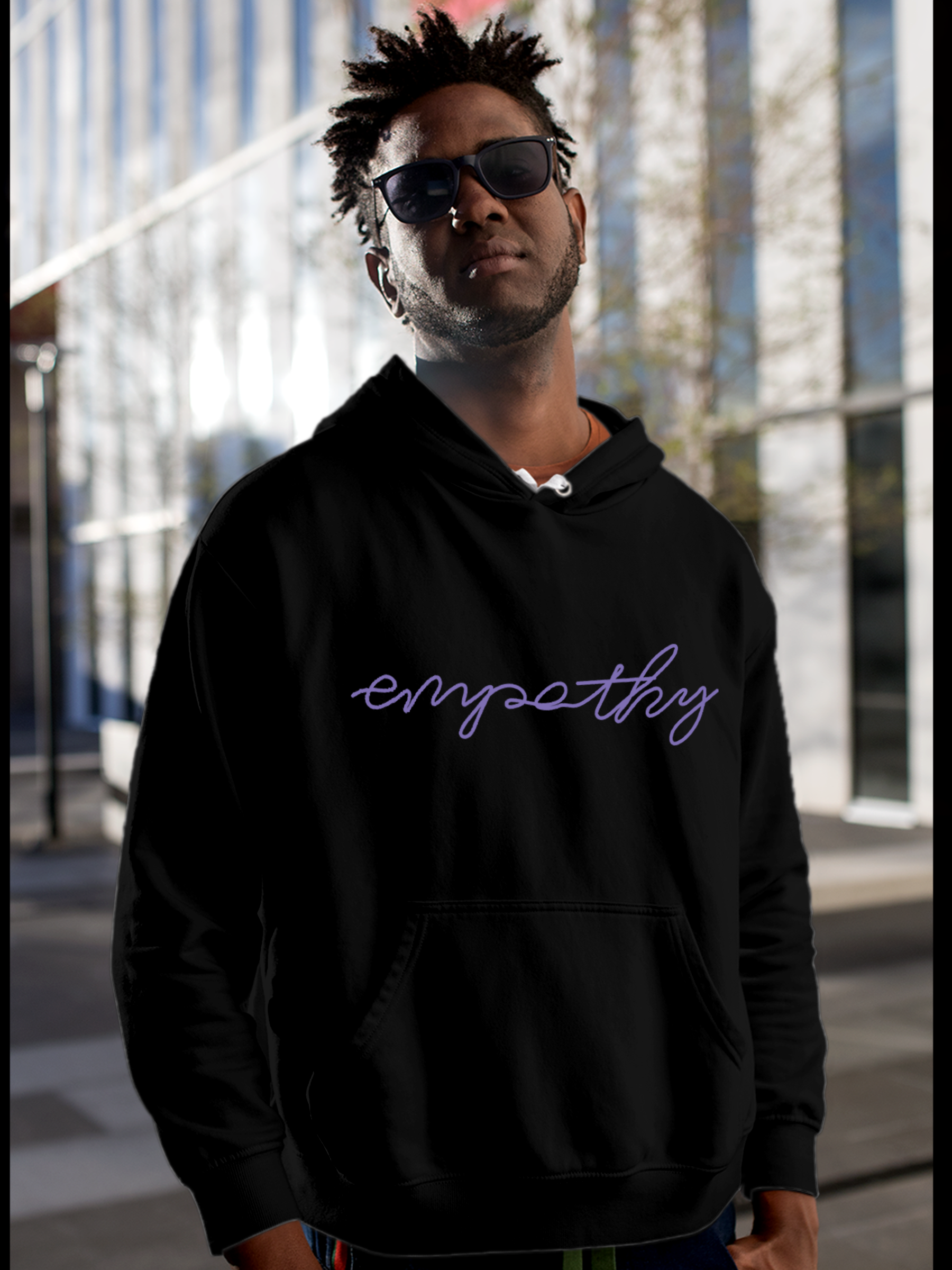 Model wearing Men's Black Hoodie Sweatshirt with 'Empathy' design, offering effortless style and premium comfort