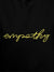 Close up of 'Empathy' design on Women's Black Hoodie Sweatshirt, highlighting intricate details and vibrant print.