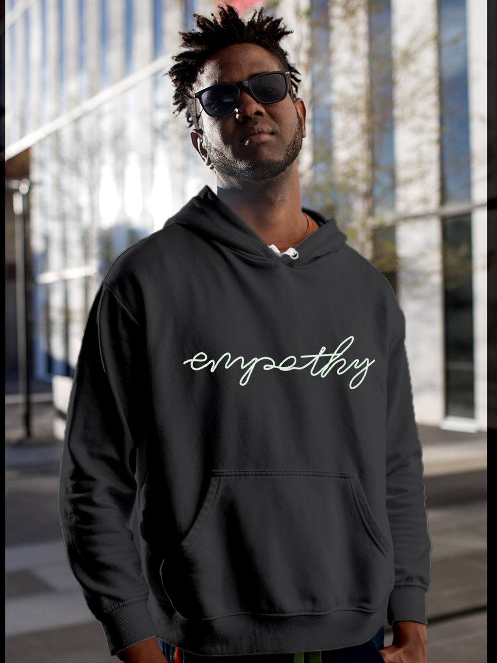 Model wearing Men's Dark Grey Hoodie Sweatshirt with 'Empathy' design, offering effortless style and premium comfort