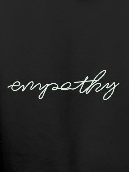 Close up of 'Empathy' design on Men's Dark Grey Hoodie Sweatshirt, highlighting intricate details and vibrant print.