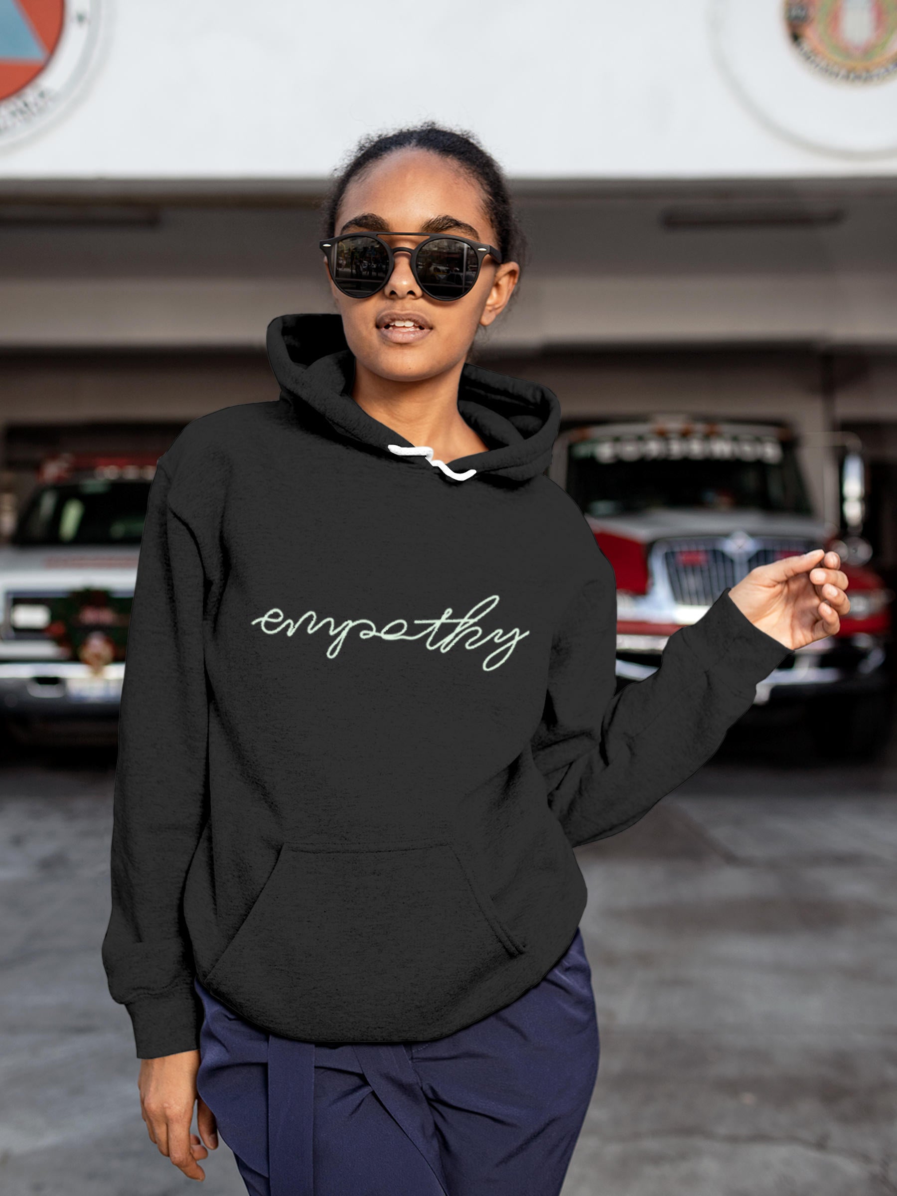 Model wearing Women's Dark Grey Hoodie Sweatshirt with 'Empathy' design, offering effortless style and premium comfort