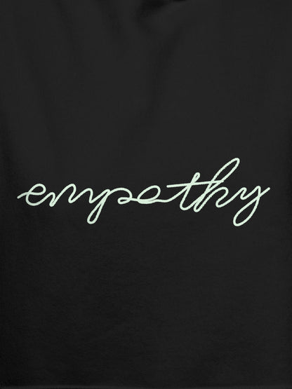 Close up of 'Empathy' design on Women's Dark Grey Hoodie Sweatshirt, highlighting intricate details and vibrant print.