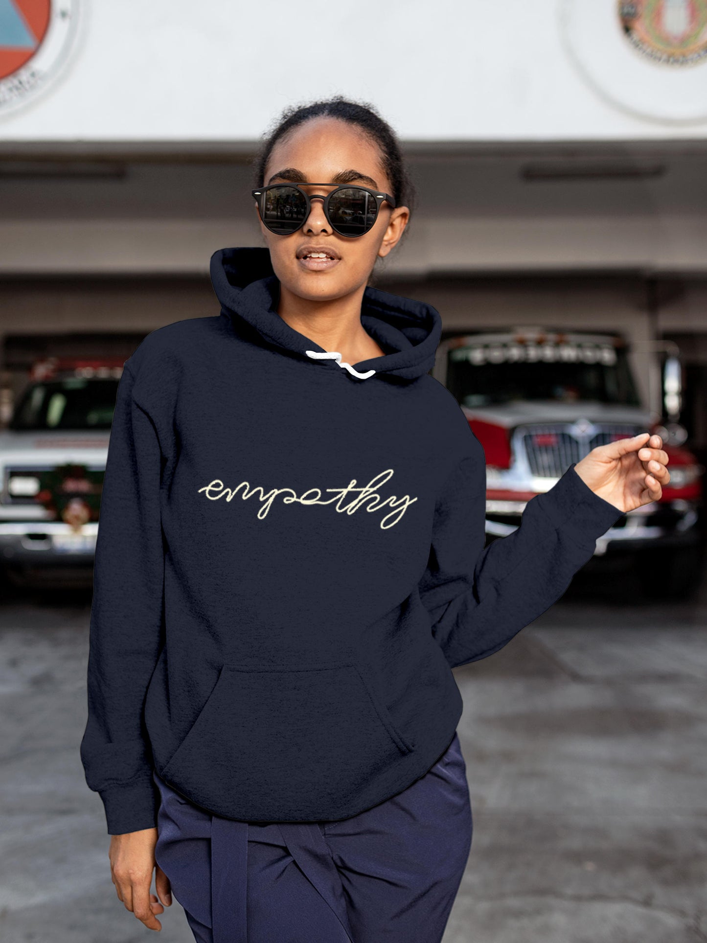 Model wearing Women's Navy Blue Hoodie Sweatshirt with 'Empathy' design, offering effortless style and premium comfort