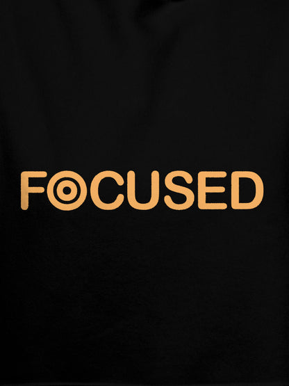 Close up of 'Focused' design on Men's Black Hoodie Sweatshirt, highlighting intricate details and vibrant print.