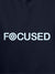 Close up of 'Focused' design on Men's Navy Blue Hoodie Sweatshirt, highlighting intricate details and vibrant print.