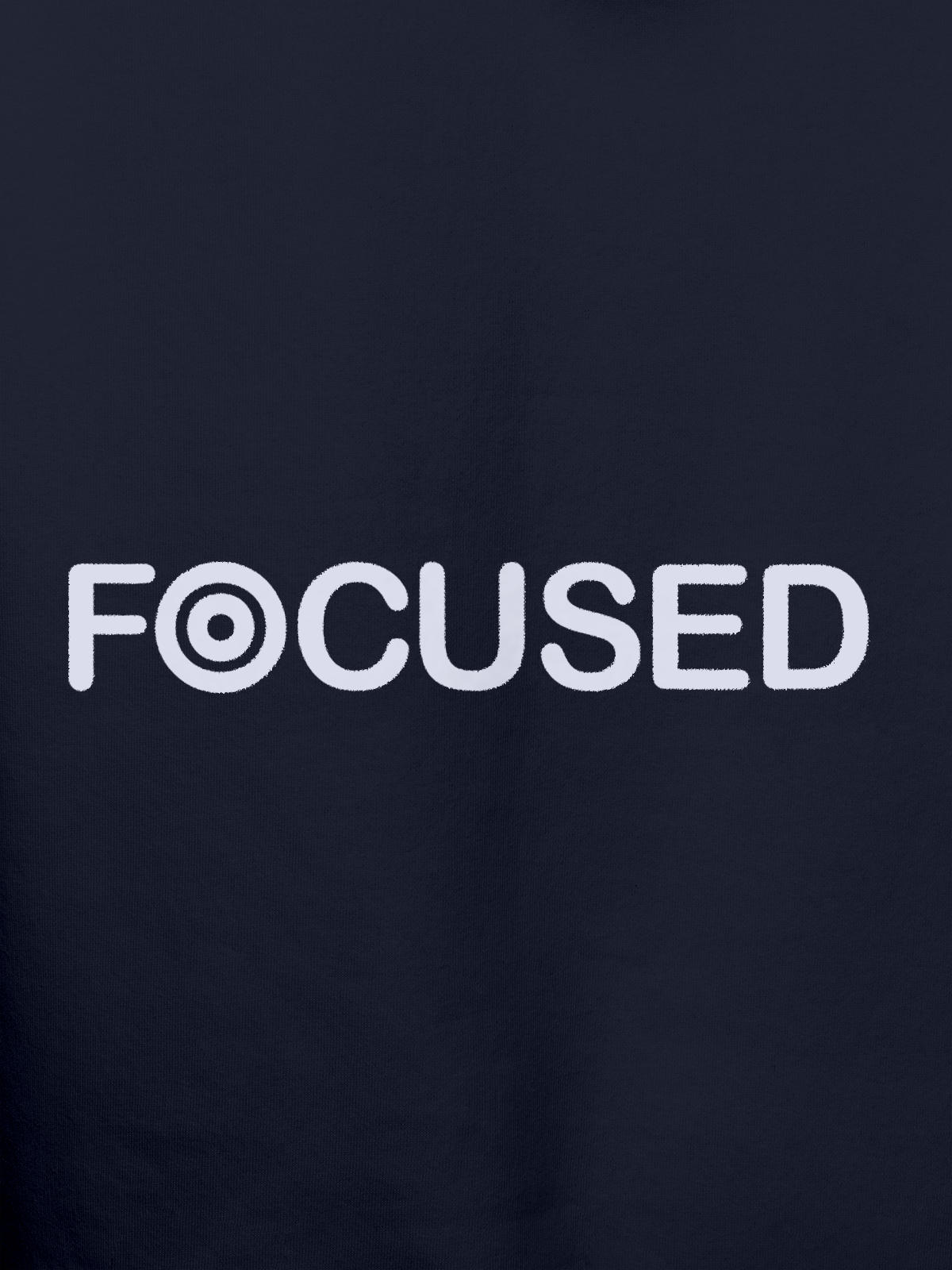 Close up of 'Focused' design on Women's Navy Blue Hoodie Sweatshirt, highlighting intricate details and vibrant print.