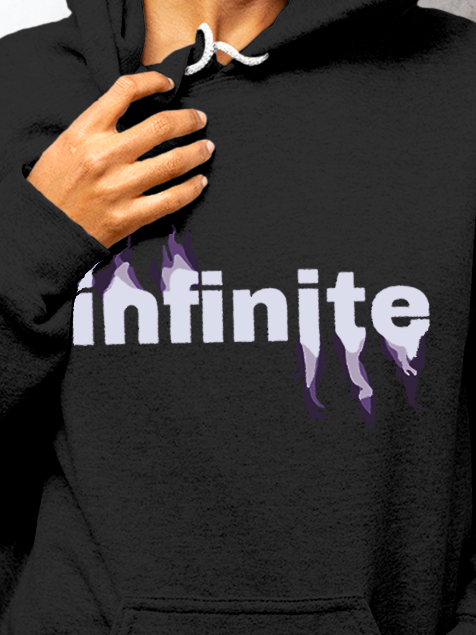 Close up of 'Infinite' design on Women's Charcoal Grey Hoodie Sweatshirt, highlighting intricate details and vibrant print.