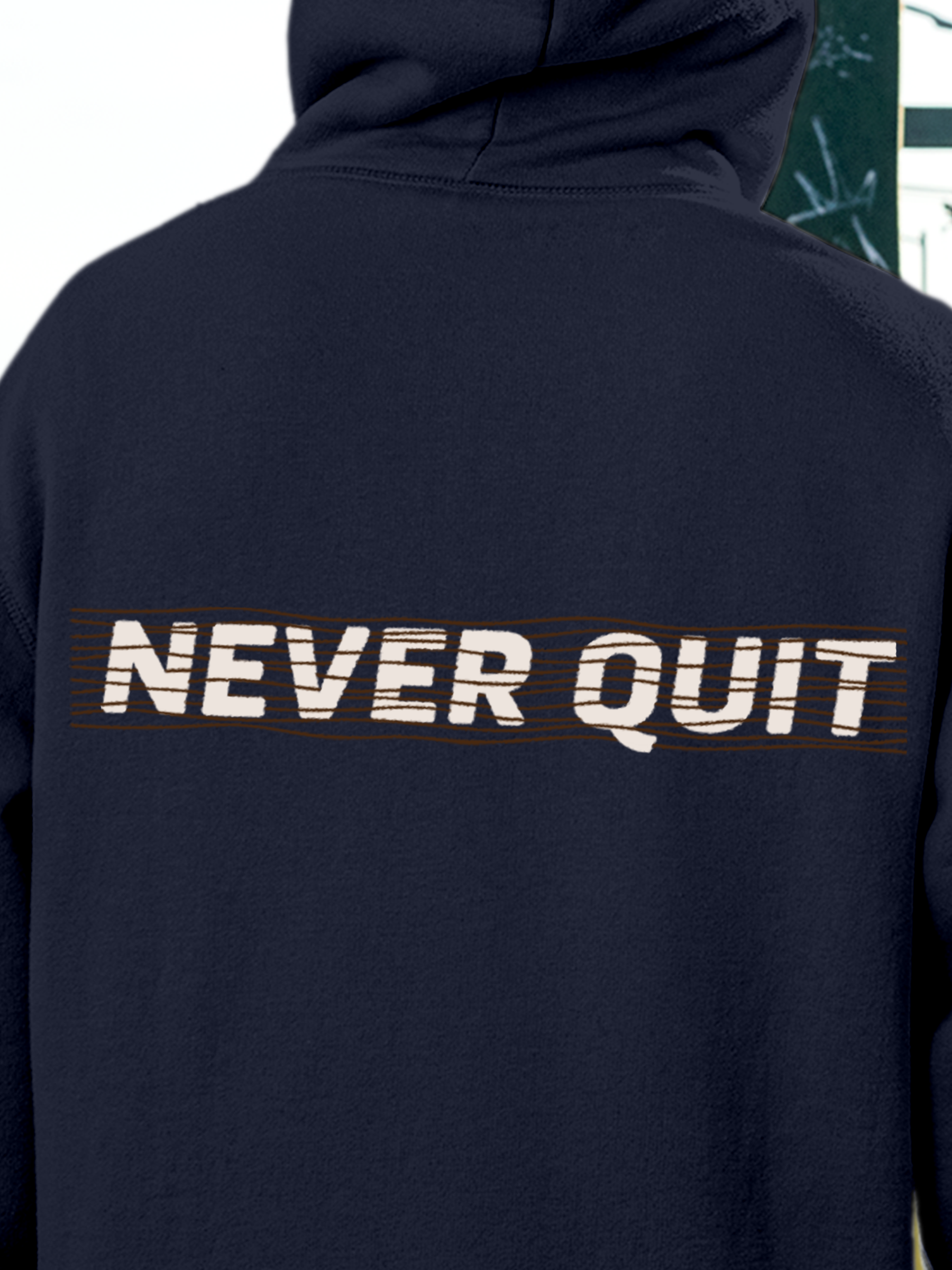 Close up of 'Never Quit' design on Men's Navy Blue Hoodie Sweatshirt, highlighting intricate details and vibrant print.