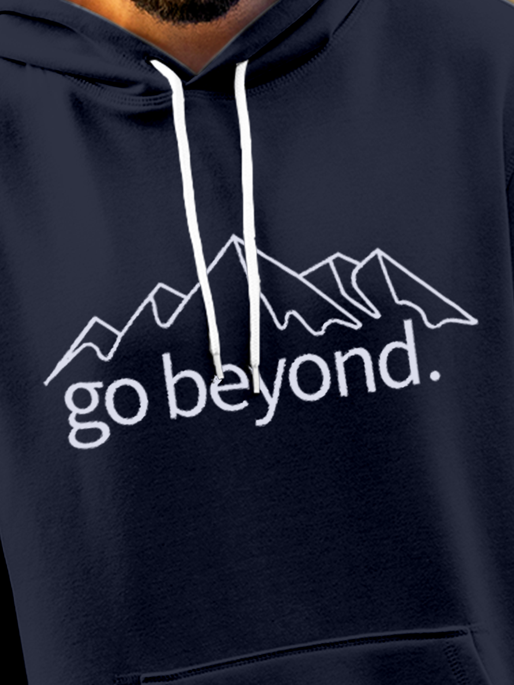 Close up of 'Go Beyond' design on Men's Navy Blue Hoodie Sweatshirt, highlighting intricate details and vibrant print.