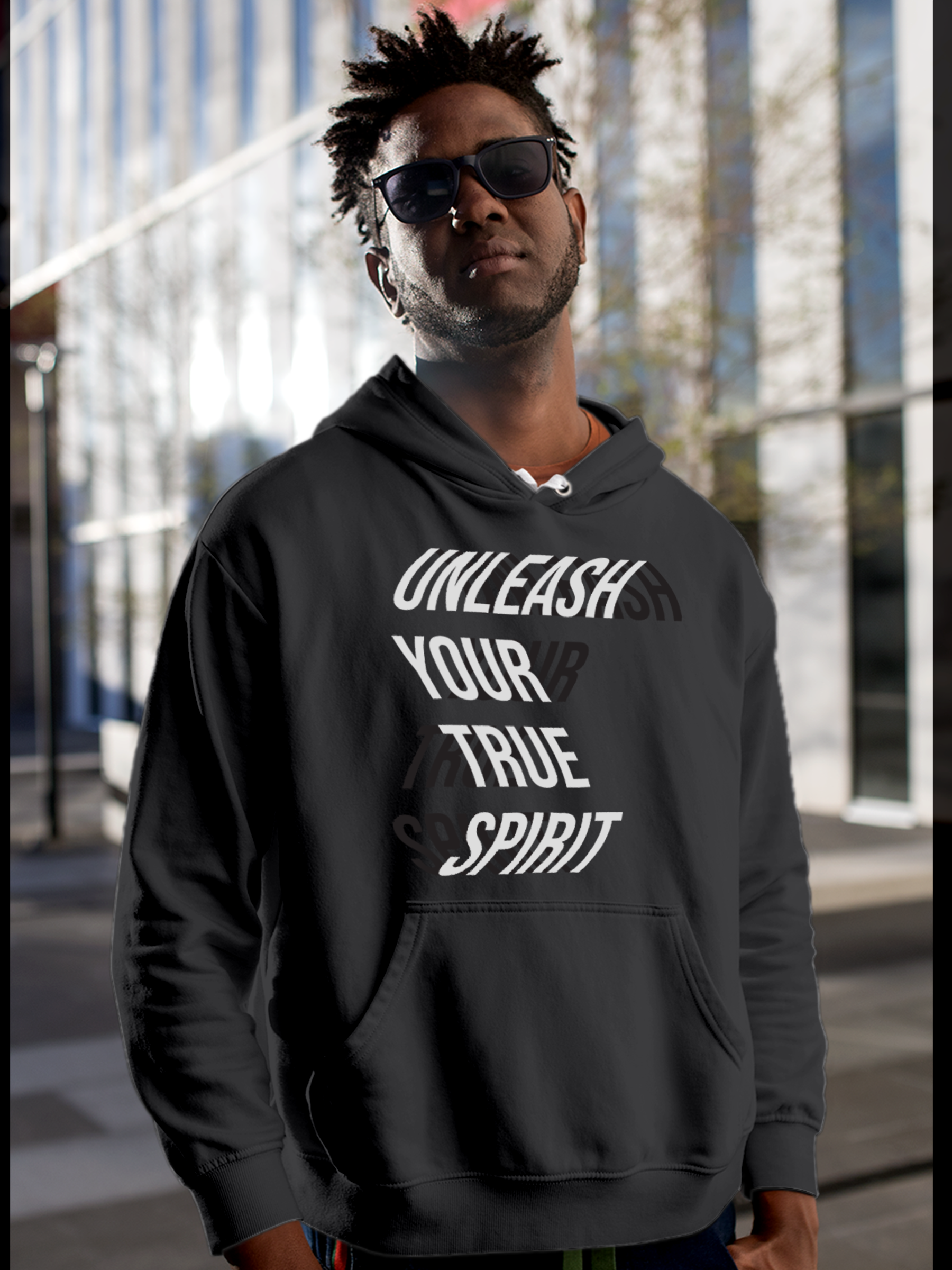 Model wearing Men's Charcoal Grey Hoodie Sweatshirt with 'Unleash Your True Spirit' design, offering effortless style and premium comfort