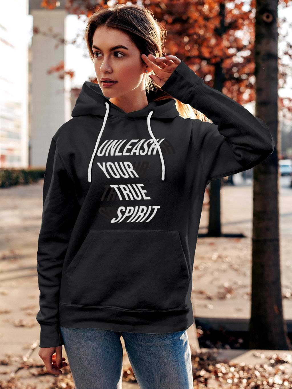 Model wearing Women's Dark Grey Hoodie Sweatshirt with 'Unleash Your True Spirit' design, offering effortless style and premium comfort
