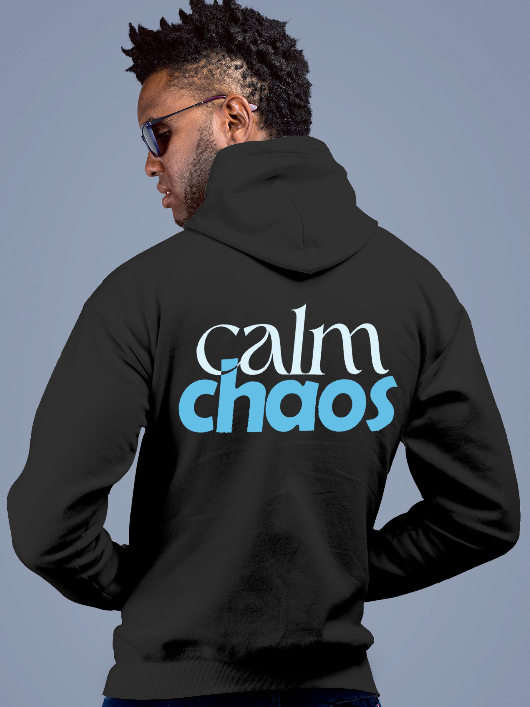 Model wearing Men's Dark Grey Hoodie Sweatshirt with 'Calm Chaos' design, offering effortless style and premium comfort