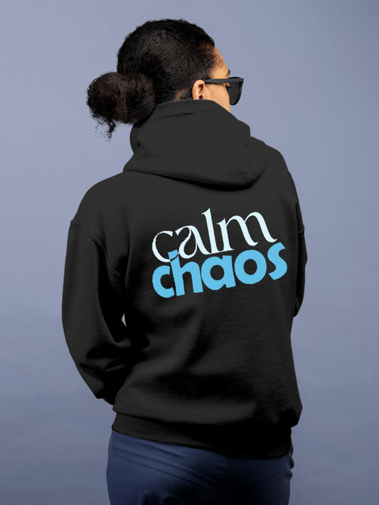 Model wearing Women's Dark Grey Hoodie Sweatshirt with 'Calm Chaos' design, offering effortless style and premium comfort