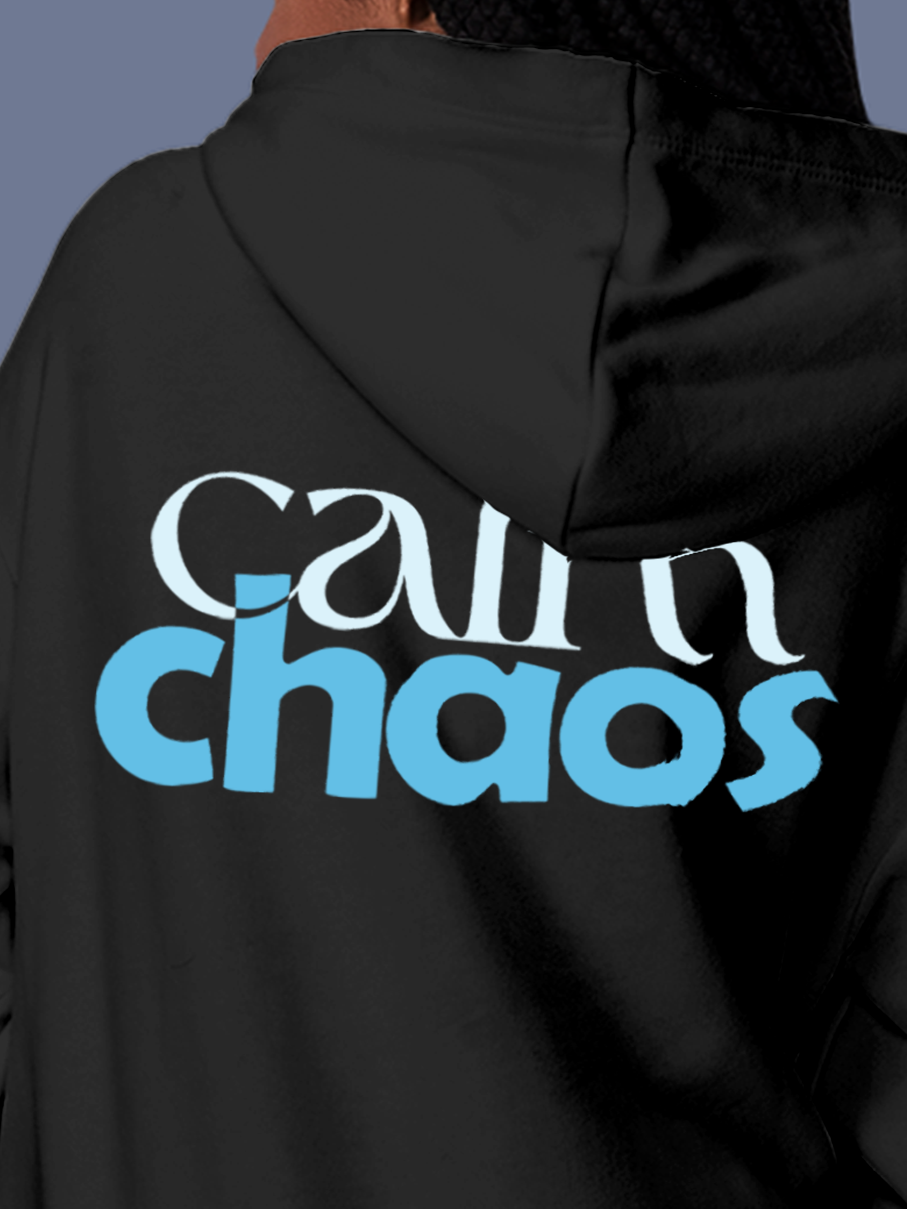 Close up of 'Calm Chaos' design on Women's Charcoal Grey Hoodie Sweatshirt, highlighting intricate details and vibrant print.