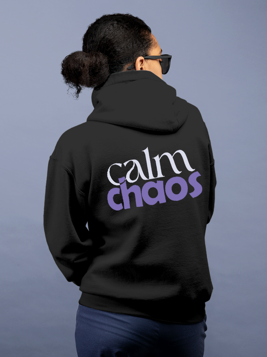 Fighterhero Hoodie Collection: Model wearing Women's Charcoal Grey Hoodie Sweatshirt with 'Calm Chaos' design