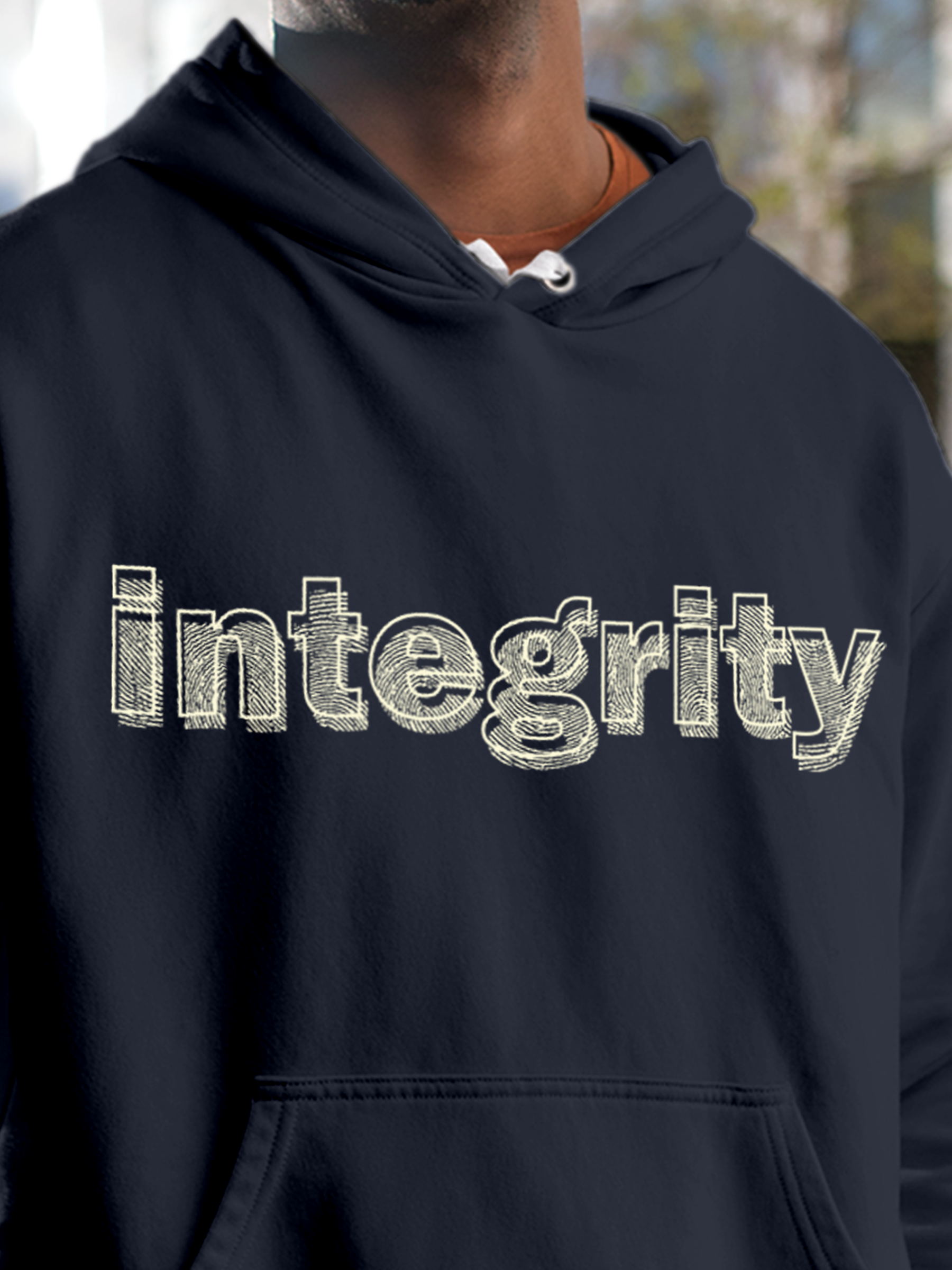 Close up of 'Integrity' design on Men's Navy Blue Hoodie Sweatshirt, highlighting intricate details and vibrant print.
