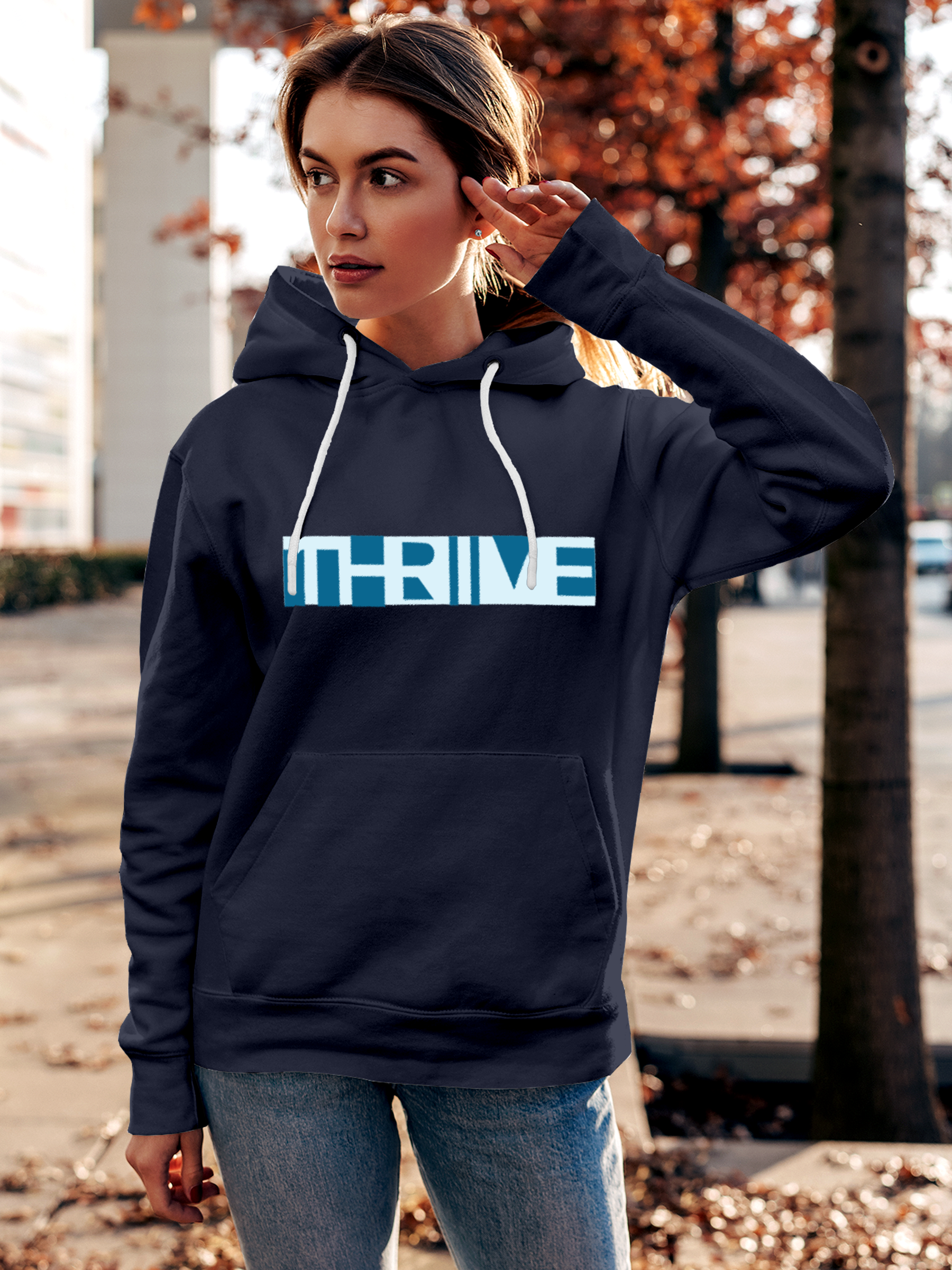 Model wearing Women's Navy Blue Hoodie Sweatshirt with 'Thrive' design, offering effortless style and premium comfort
