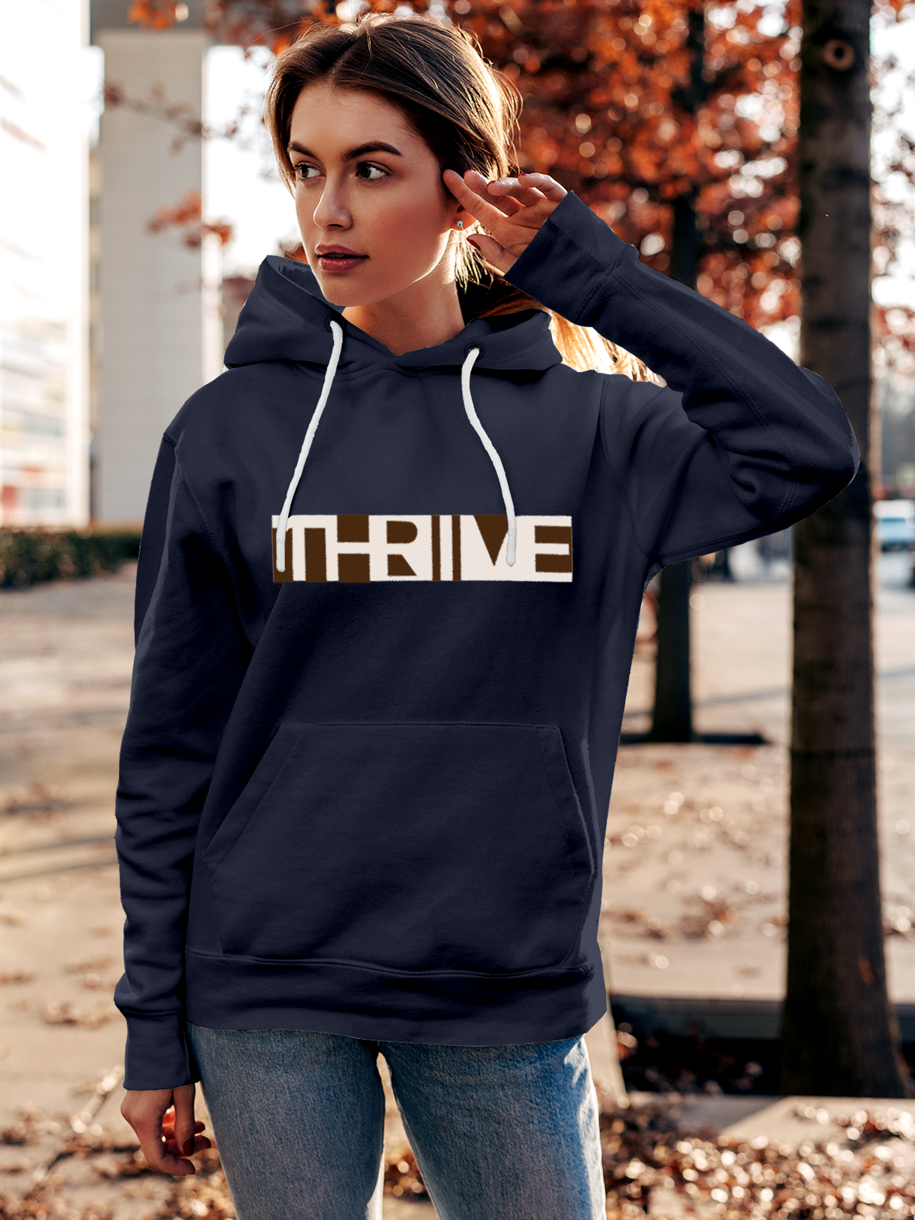 Model wearing Women's Navy Blue Hoodie Sweatshirt with 'Thrive' design, offering effortless style and premium comfort