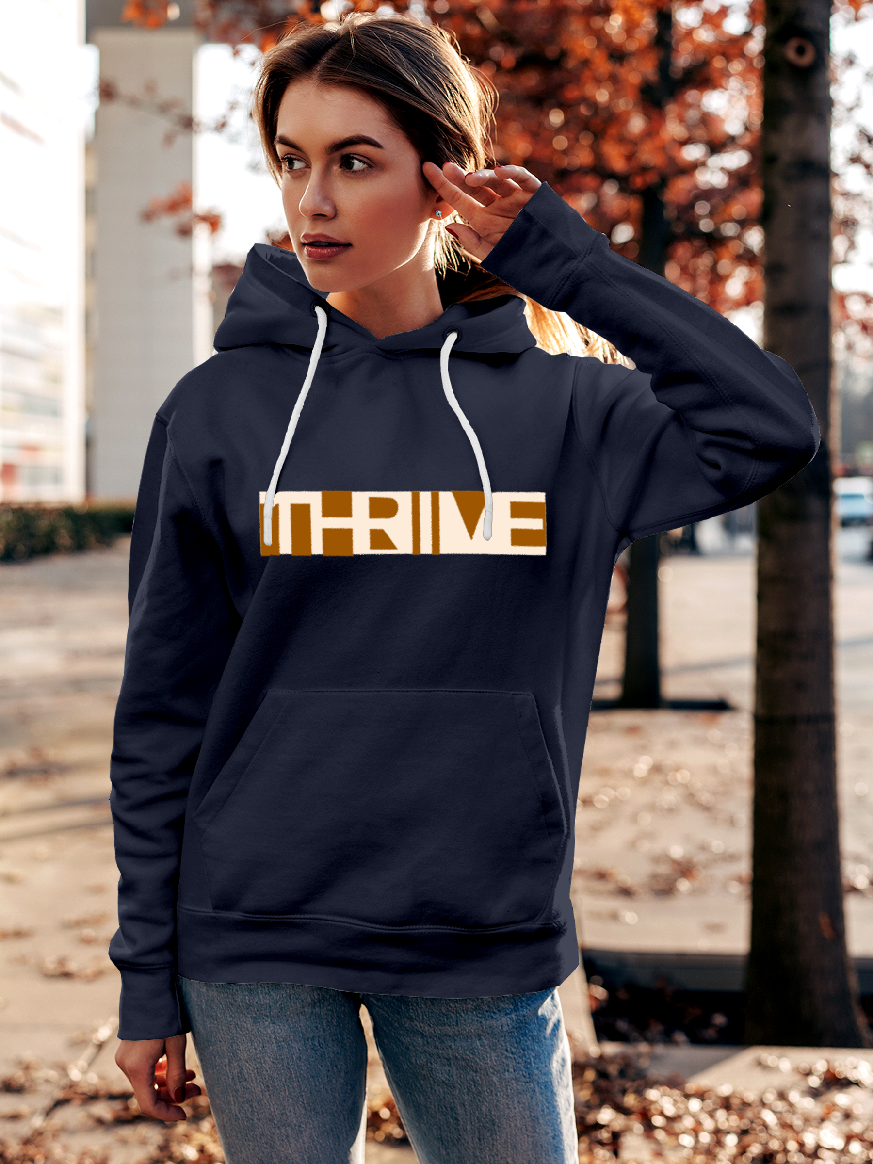 Model wearing Women's Navy Blue Hoodie Sweatshirt with 'Thrive' design, offering effortless style and premium comfort