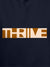 Close up of 'Thrive' design on Women's Navy Blue Hoodie Sweatshirt, highlighting intricate details and vibrant print.