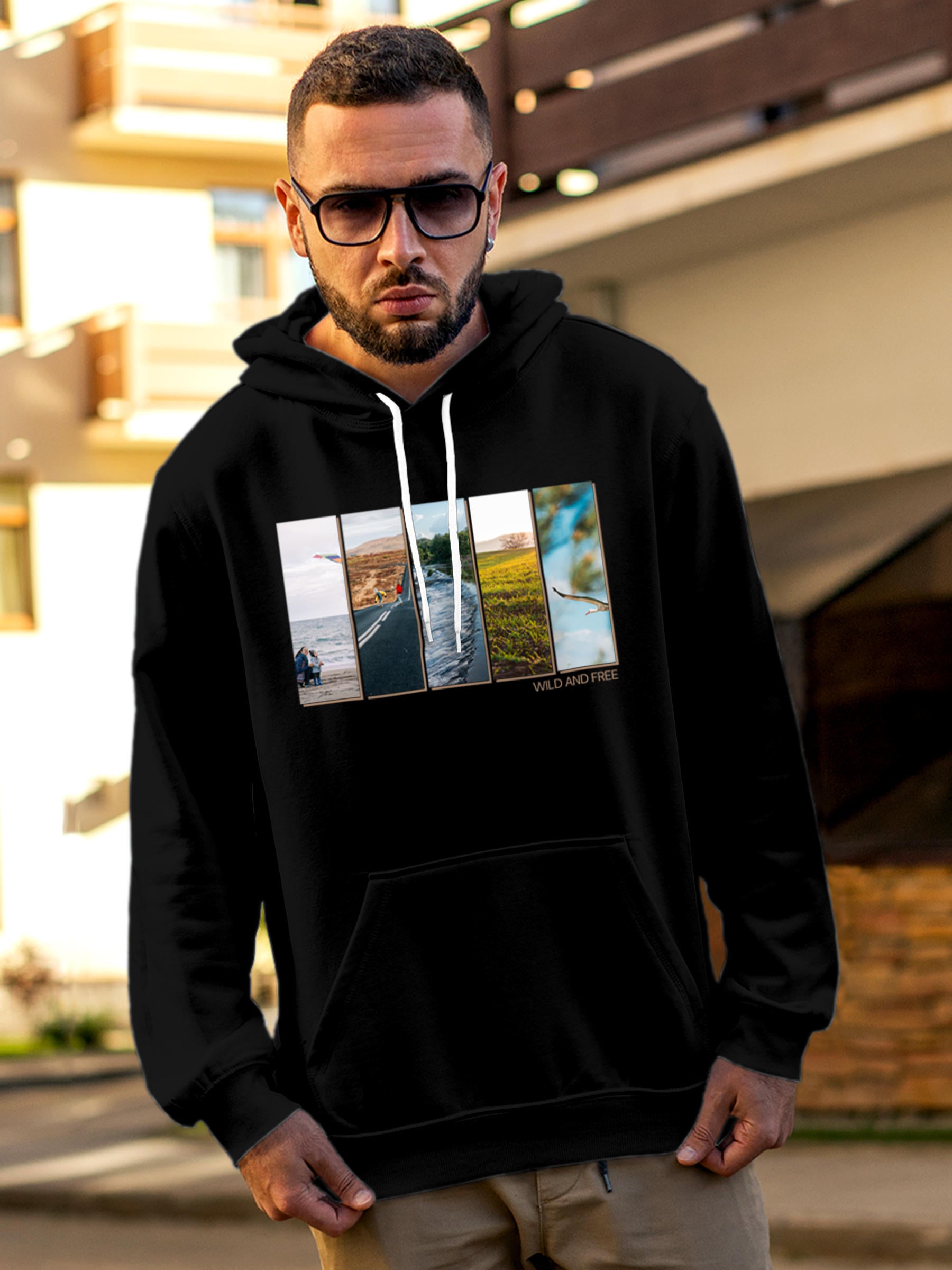 Model wearing Men's Black Hoodie Sweatshirt with 'Wild & Free' design, offering effortless style and premium comfort