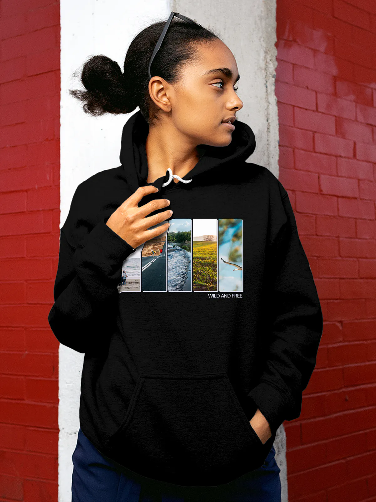 Model wearing Women's Black Hoodie Sweatshirt with 'Wild & Free' design, offering effortless style and premium comfort