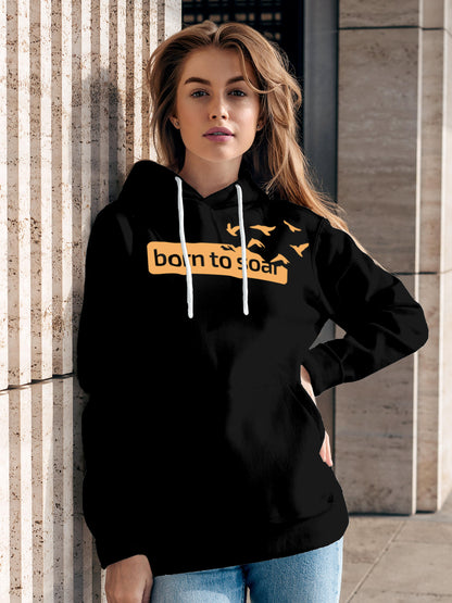 Model wearing Women's Black Hoodie Sweatshirt with 'Born To Soar' design, offering effortless style and premium comfort