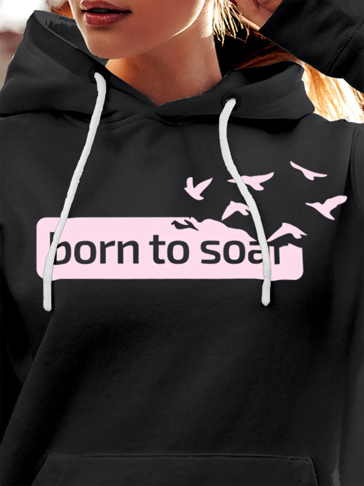 Close up of 'Born To Soar' design on Women's Dark Grey Hoodie Sweatshirt, highlighting intricate details and vibrant print.