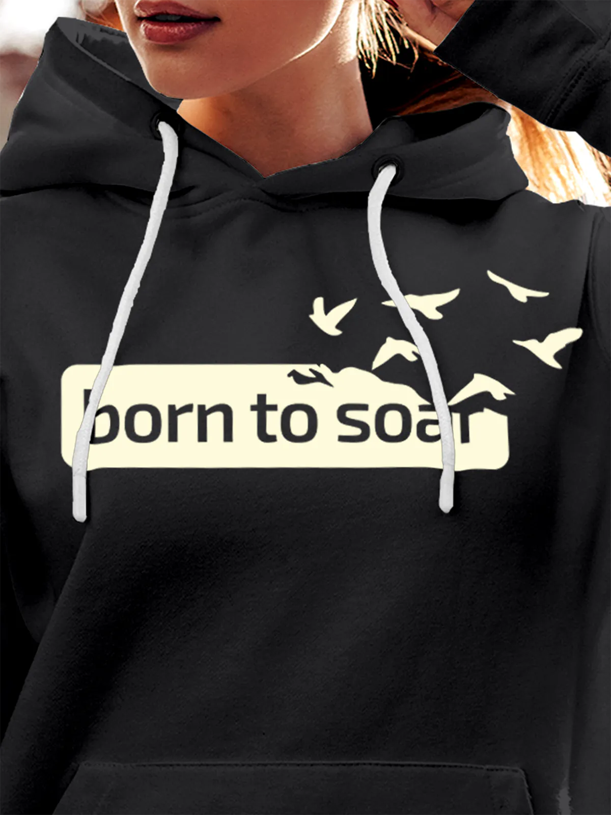 Close up of 'Born To Soar' design on Women's Dark Grey Hoodie Sweatshirt, highlighting intricate details and vibrant print.