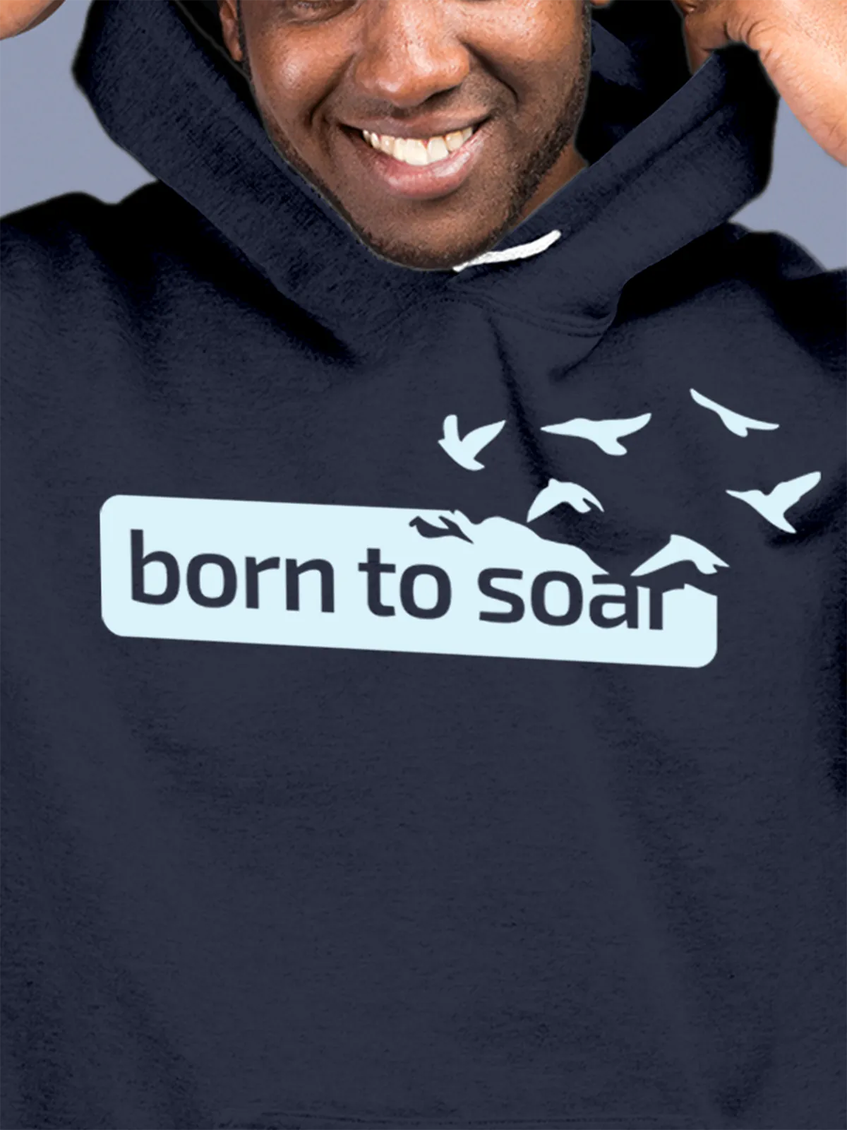 Close up of 'Born To Soar' design on Men's Navy Blue Hoodie Sweatshirt, highlighting intricate details and vibrant print.