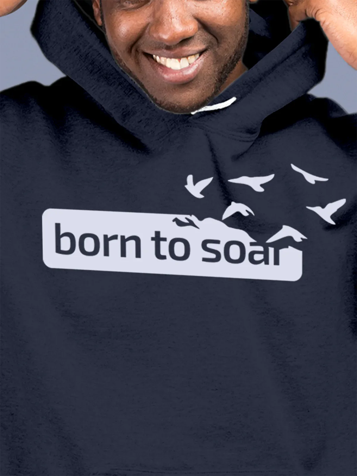 Close up of 'Born To Soar' design on Men's Navy Blue Hoodie Sweatshirt, highlighting intricate details and vibrant print.