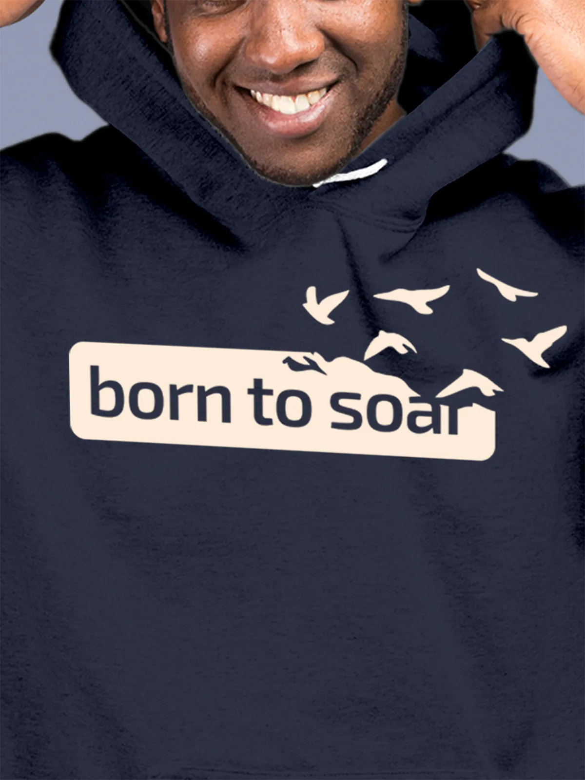 Close up of 'Born To Soar' design on Men's Navy Blue Hoodie Sweatshirt, highlighting intricate details and vibrant print.