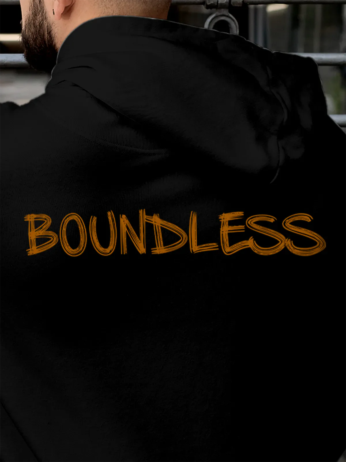 Close up of 'Boundless' design on Men's Black Hoodie Sweatshirt, highlighting intricate details and vibrant print.