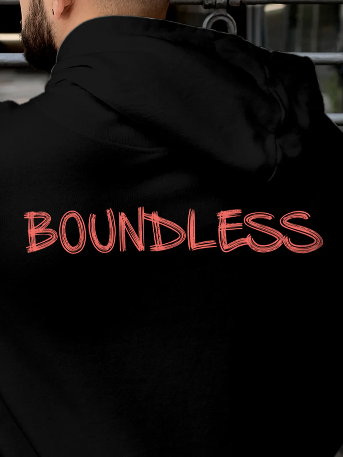 Close up of 'Boundless' design on Men's Black Hoodie Sweatshirt, highlighting intricate details and vibrant print.