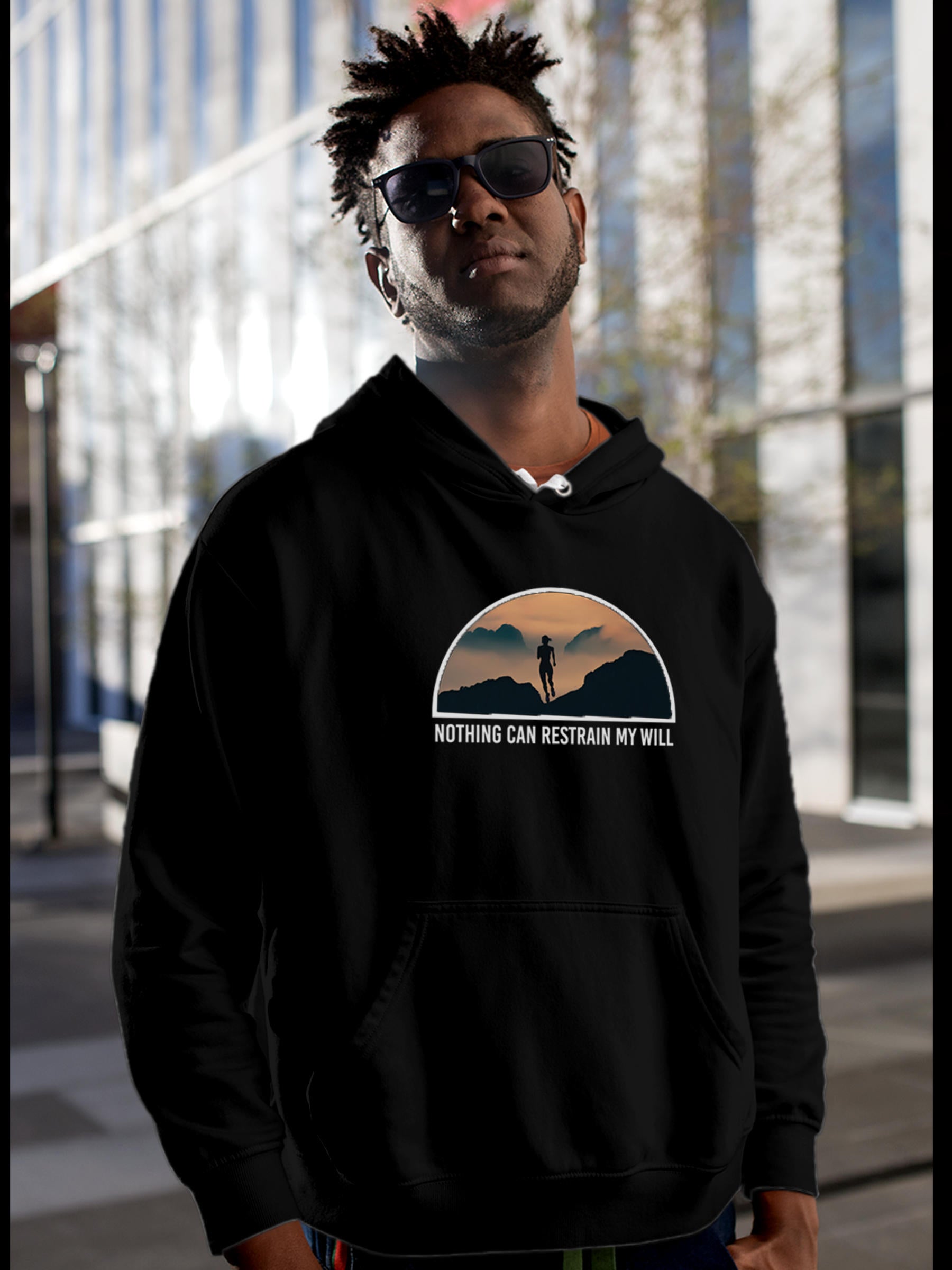 Model wearing Men's Black Hoodie Sweatshirt with 'Limitless Will' design, offering effortless style and premium comfort