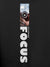 Close up of 'Focus' design on Men's Dark Grey Hoodie Sweatshirt, highlighting intricate details and vibrant print.