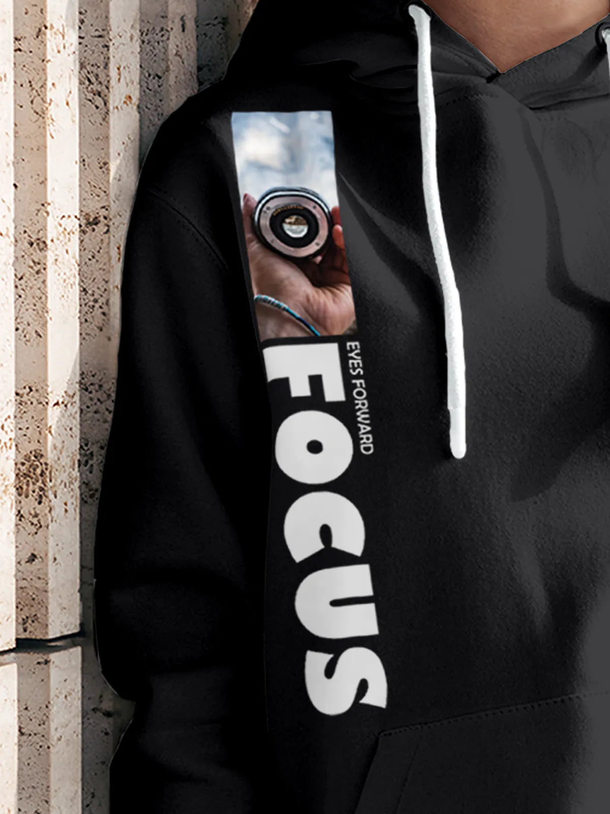 Close up of 'Focus' design on Women's Dark Grey Hoodie Sweatshirt, highlighting intricate details and vibrant print.
