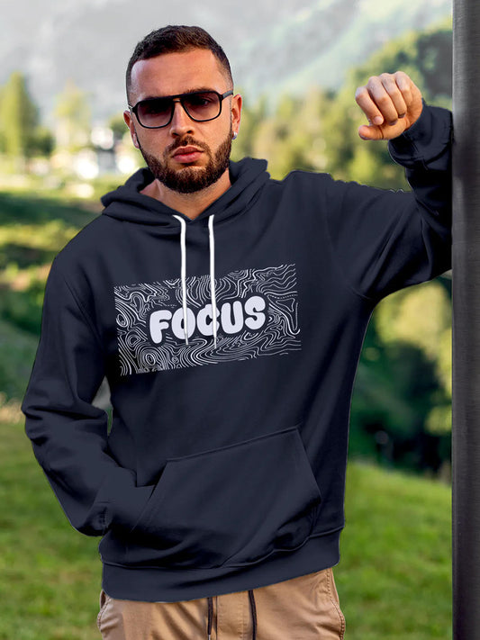 Model wearing Men's Navy Blue Hoodie Sweatshirt with 'Focus In Chaos' design, offering effortless style and premium comfort