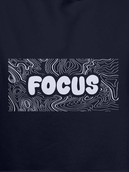 Close up of 'Focus In Chaos' design on Men's Navy Blue Hoodie Sweatshirt, highlighting intricate details and vibrant print.