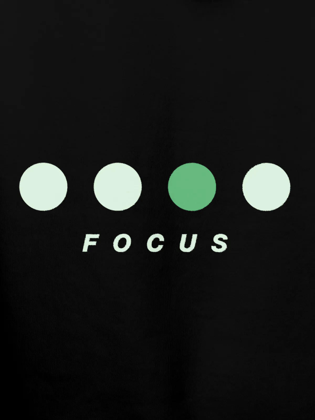 Close up of 'Focus On Goal' design on Women's Black Hoodie Sweatshirt, highlighting intricate details and vibrant print.