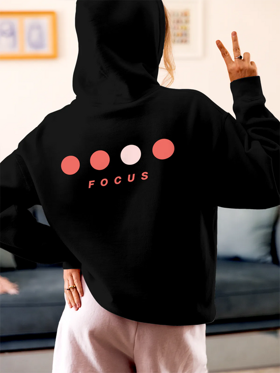 Fighterhero Hoodies: Model wearing Women's Black Hoodie Sweatshirt with 'Focus On Goal' design