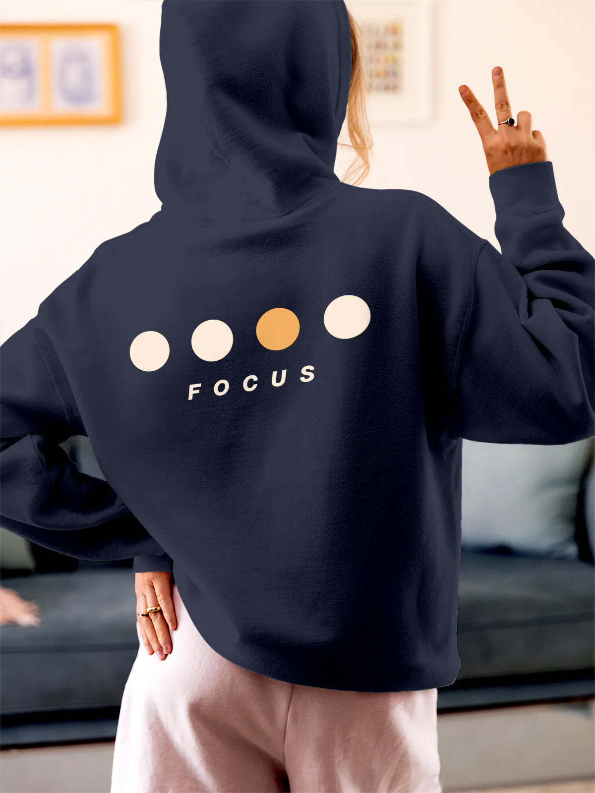 Model wearing Women's Navy Blue Hoodie Sweatshirt with 'Focus On Goal' design, offering effortless style and premium comfort