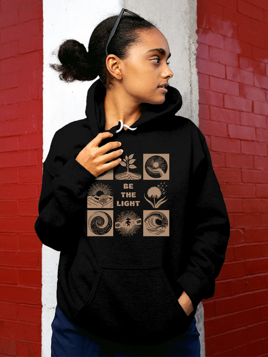 Fighterhero Hoodies: Model wearing Women's Black Hoodie Sweatshirt with 'Be The Light' design